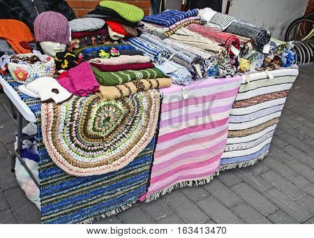 Of domestic hand-woven patchwork on a table.