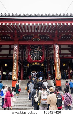 Toyko Japan - 13 October : Tourists walk on Senso ji shrine red gate. the history culture Heritage in Asakusa district Tokyo Japan at 13 October 2016