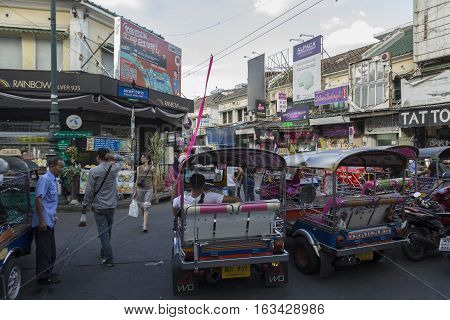 BANGKOK THAILAND - DEC 24 : parking of tuktuk car in Khao San road on december 24 2016. tuktuk is popular server for tourist in Bangkok.