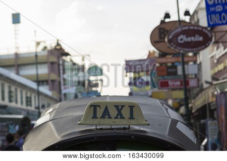 BANGKOK THAILAND - DEC 24 : taxi cab of tuktuk service car in Khao San road on december 24 2016. tuktuk is popular server for tourist in Bangkok.