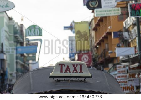 BANGKOK THAILAND - DEC 24 : taxi cab of tuktuk taxi car in Khao San road on december 24 2016. tuktuk is popular server for tourist in Bangkok.