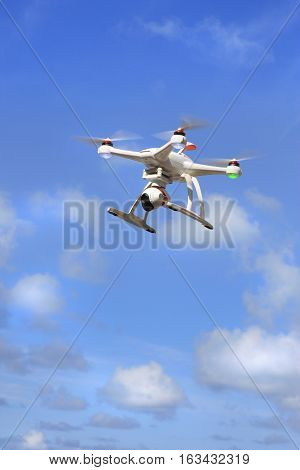 flying drone with camera and blue sky