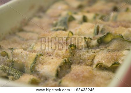 layer of zucchini au gratin grilled in oven