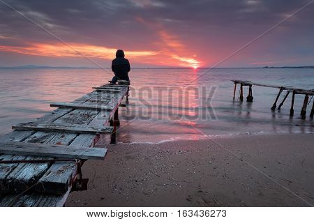 Magnificent sunset with clouds and fire sun in the middle of December, at the village of Ravda, Bulgaria