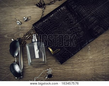 Ladies Fashion Accessories. Handbag with perfume and sunglasses