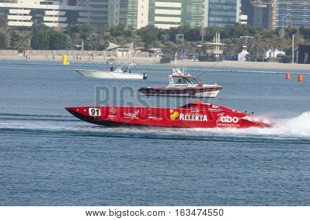ABU DHABI UAE - NOV 24 2016: Red racing boat at the Powerboat Championship 2016 in Abu Dhabi United Arab Emirates