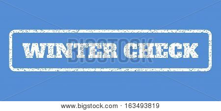 White rubber seal stamp with Winter Check text. Vector message inside rounded rectangular frame. Grunge design and scratched texture for watermark labels. Horisontal sign on a blue background.