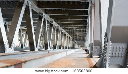 Bridge construction. Metal framework of the bridge