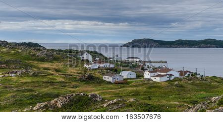 Small village community in Newfoundland.  Houses nestled amongst rocky landscape in Twillingate Newfoundland, Canada.