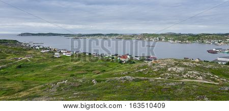 Small village community in Twillingate, Newfoundland.  Houses nestled amongst rocky landscape in Twillingate Newfoundland, Canada.