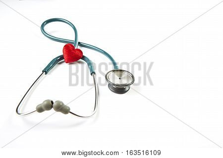 Red heart and stethoscope isolated on white background