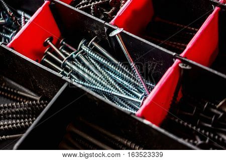 Screw in plastic organizer box close up