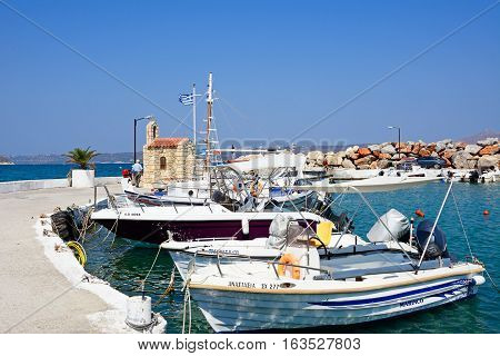 KALYVES, CRETE - SEPTEMBER 16, 2016 - Boats moored in the harbour Kalyves Crete Greece Europe, September 16, 2016.
