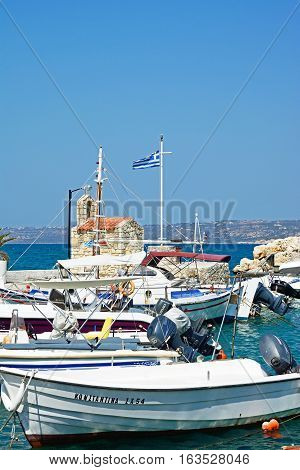 KALYVES, CRETE - SEPTEMBER 16, 2016 - Boats moored in the harbour Kalyves Crete Greece Europe, September 16, 2016.
