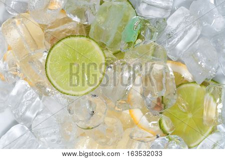 Ice cubes and citrus fruit mixed toghether