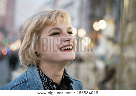 Bucolic Portrait Of Smiling Cute Young Girl  Over City Lights Background