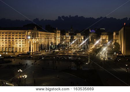 night Square of Independence in Kiev with lights and moving cars
