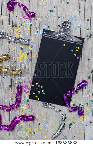 Carnival Confetti On Wood Background