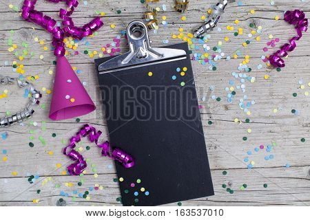 Carnival Confetti On Wood Background