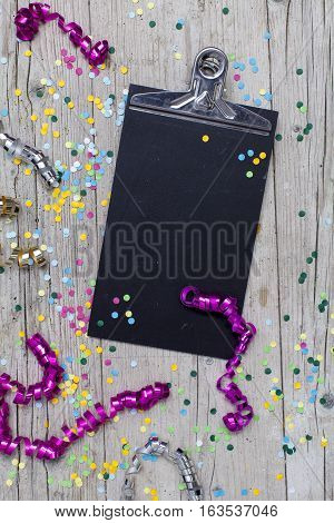 Carnival Confetti On Wood Background
