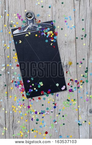 Carnival Confetti On Wood Background