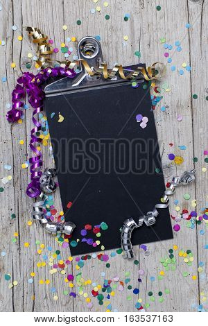 Carnival Confetti On Wood Background