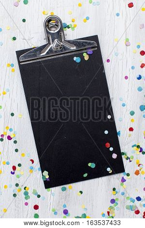 Carnival Confetti On Wood Background