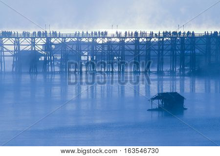 Wooden bridge of Sangkla Buri in Kanjanaburi province,Thailand, Morning day.