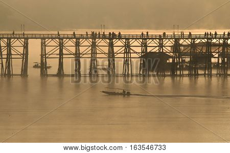 Wooden bridge of Sangkla Buri in Kanjanaburi province,Thailand, Morning day.