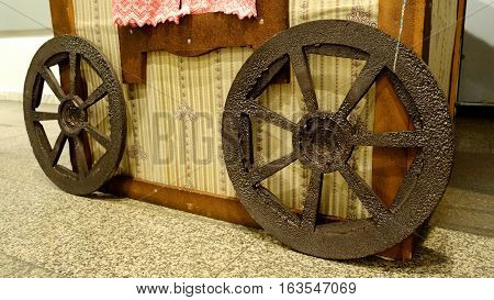 decorative wooden wagon wheel in the room