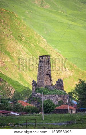 Medieval watch tower in village Sno (Sno castle) Kazbegi region Georgia.