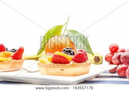 on an plate of delicious fruit tart