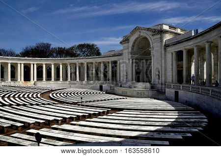 Arlington Virginia - April 12 2014: The Memorial Amphitheatre with its curved colonnade and seating benches at Arlington National Cemetery