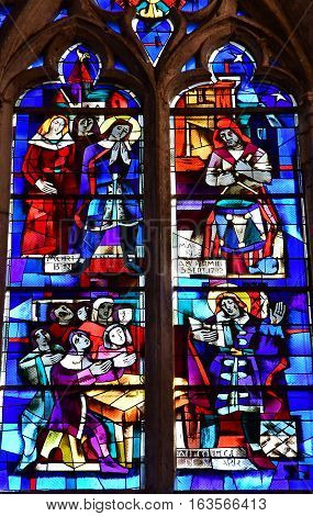 Gournay en Bray France - september 7 2016 : stained glass window of the Saint Hildevert collegiate church