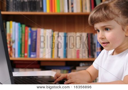 little girl and laptop