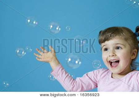 Little girl and bubbles