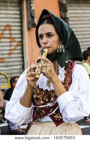 SELARGIUS, ITALY - September 13, 2015: Former marriage Selargino - Sardinia - portrait of a beautiful girl in traditional Sardinian costume