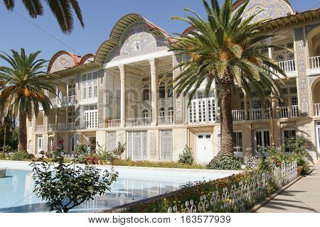 SHIRAZ, IRAN - OCTOBER 7, 2016: Beautiful palace within the Eram Garden on October 7, 2016 in Shiraz, Iran, Asia