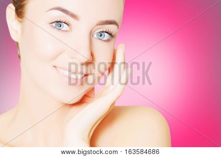 portrait of beautiful smiling woman with perfect skin