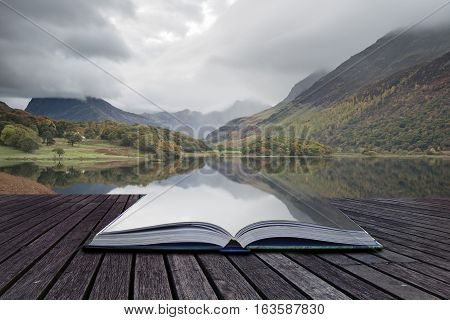 Beautiful Autumn Fall Landscape Image Of Crummock Water At Sunrise In Lake District England Coming O