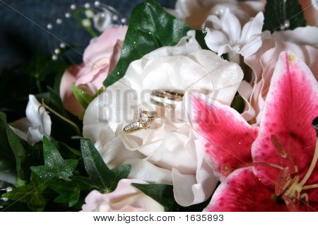 Weddling Flowers With The Bridal Rings