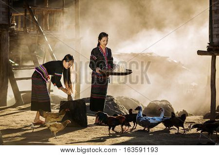 Tribal people living Geum Mugabe in costume wearing a beautiful city in Laos.