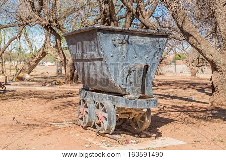 KOFFIEFONTEIN SOUTH AFRICA - DECEMBER 24 2016: An historic mine-cart also called a cocopan in Koffiefontein (coffee fountain) a diamond mining town in the Free State Province