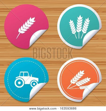 Round stickers or website banners. Agricultural icons. Wheat corn or Gluten free signs symbols. Tractor machinery. Circle badges with bended corner. Vector