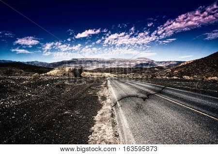 Road with a crack from side to side