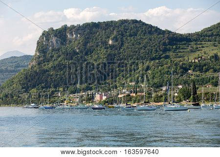 BARDOLINO ITALY - MAY 4 2016: Sailboats at Porto di Bardolino harbor on The Garda Lake . Italy