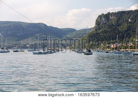 BARDOLINO ITALY - MAY 4 2016: Sailboats at Porto di Bardolino harbor on The Garda Lake . Italy
