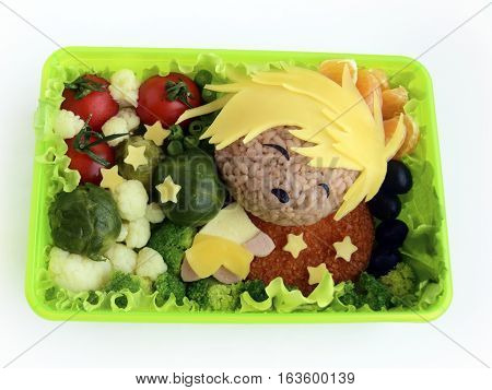 The sleeping boy is made of rice. Creative food for good mood and appetite. Kyaraben, bento, chib