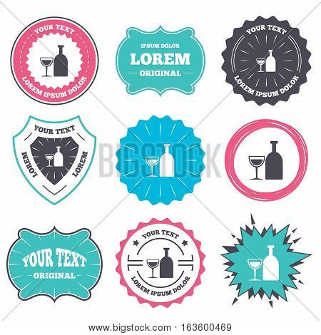 Label and badge templates. Alcohol sign icon. Drink symbol. Bottle with glass. Retro style banners, emblems. Vector