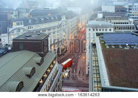 City of London street with moving transport